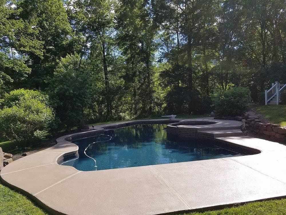 Same patio after a tan slip-resistant flake coating