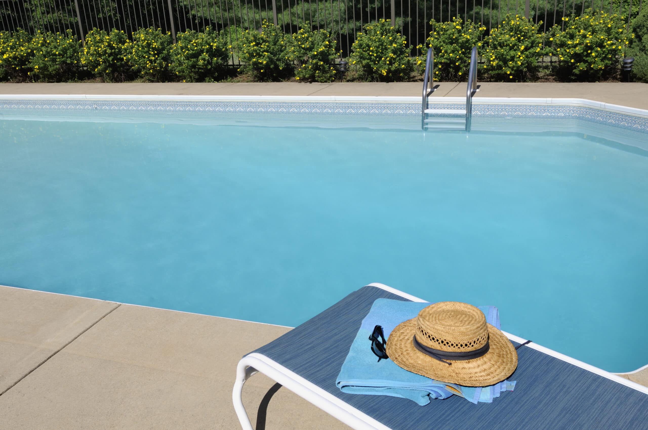 Pool deck with a light, textured coating