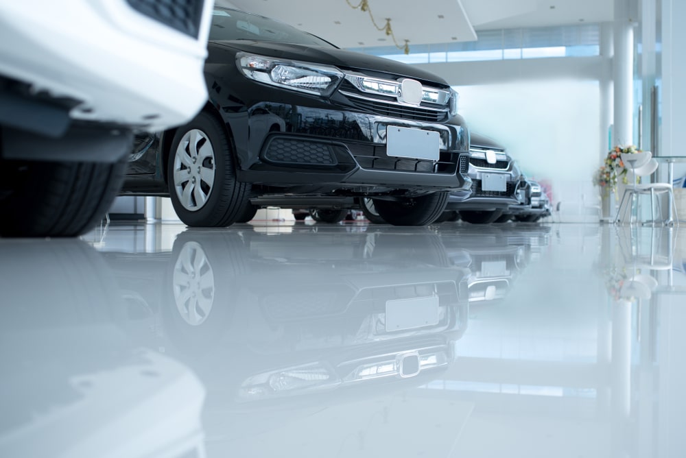 Car showroom with a high-gloss white floor