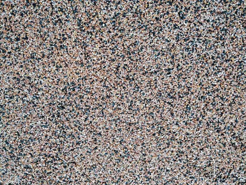 Close-up of multicolored gravel stones texture.