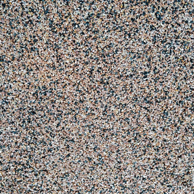 Close-up of multicolored gravel stones texture.