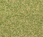 Close-up of sand grains on green surface
