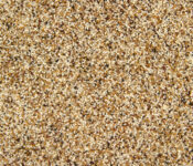 Close-up of textured brown sand grains.