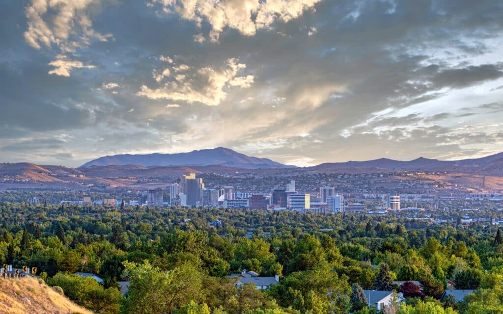 Reno cityscape with mountains and dramatic sky