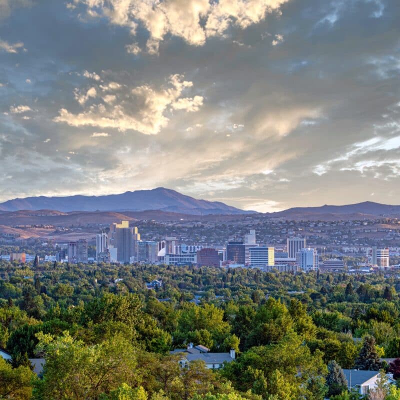 Reno cityscape with mountains and dramatic sky