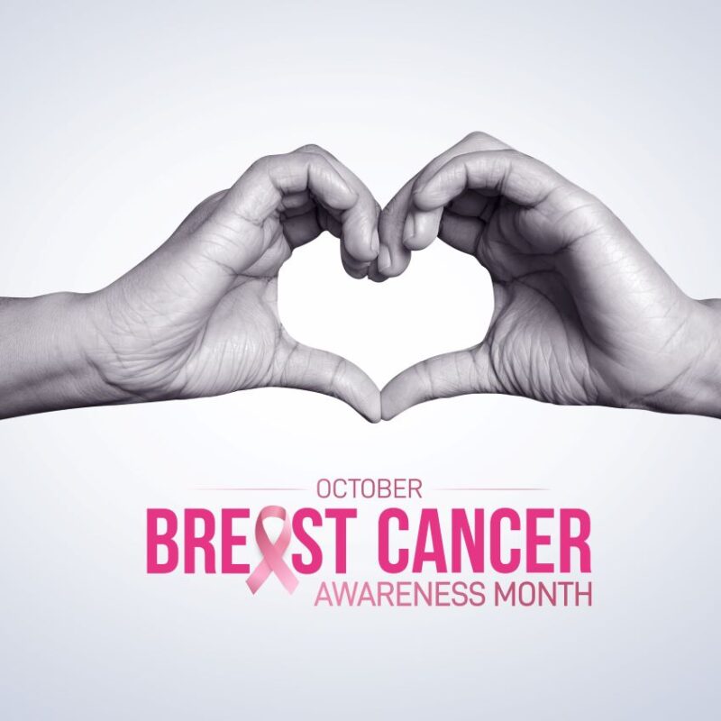 Hands forming heart, Breast Cancer Awareness Month.