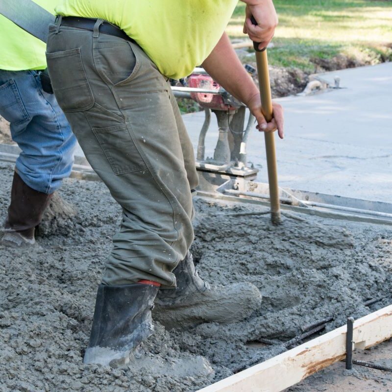 Workers finishing concrete slab on driveway in Reno, Nevada