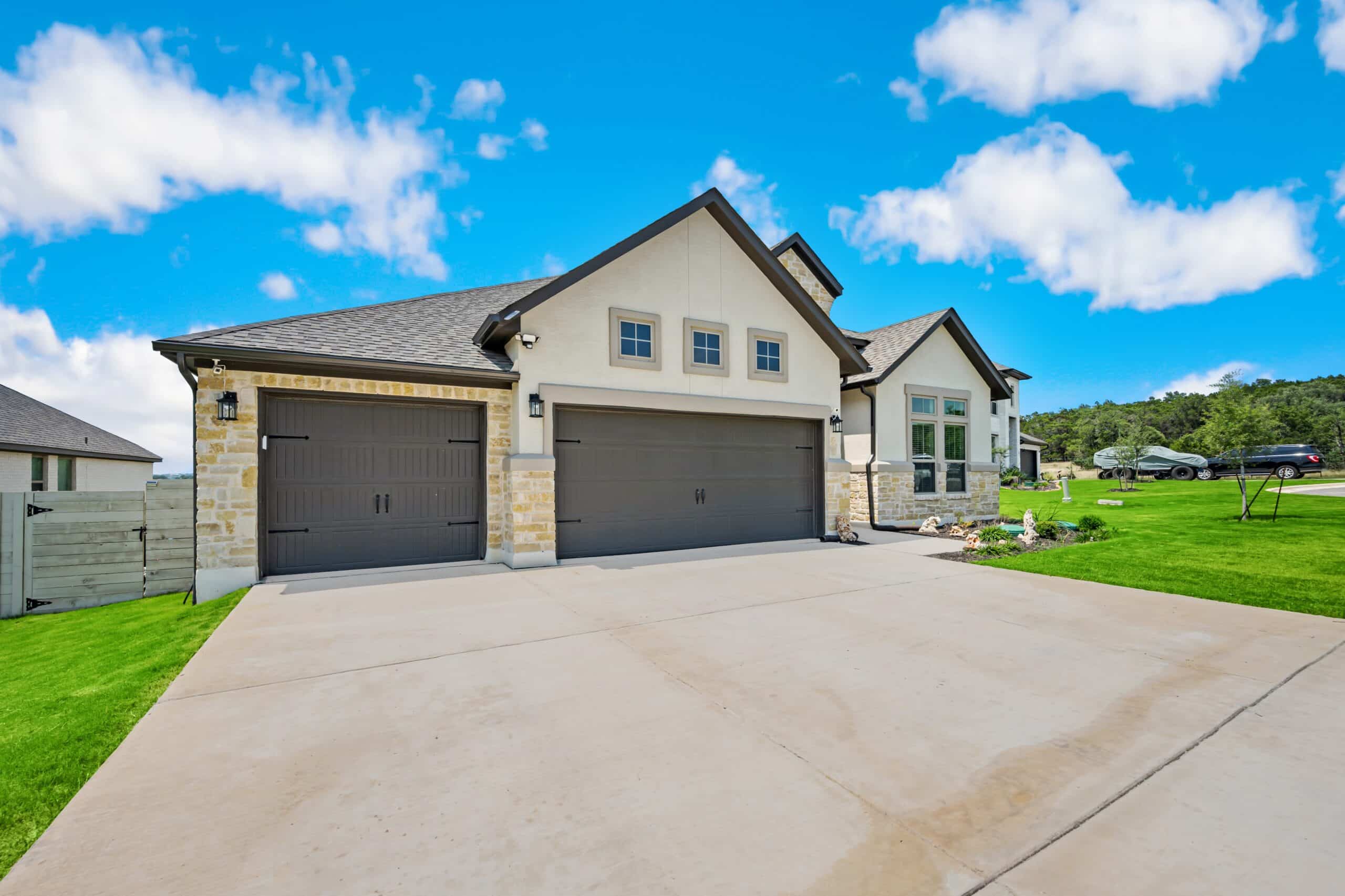 Modern house with three-car garage exterior view.