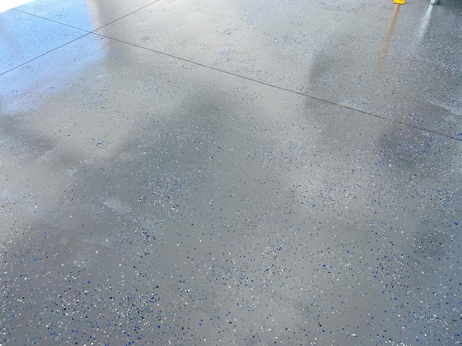 Polished concrete floor with decorative speckles.